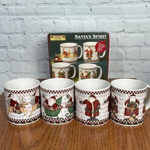 Santa's Spirit Set of 4 Mugs Debbie Mumm 2001 like new! 4 designs Oneida
